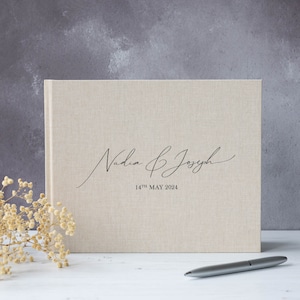 Personalised Wedding Guest Book. Simple elegant text design. 13 book colour options. Wedding gift / keepsake. Option to add Guest Book Sign.