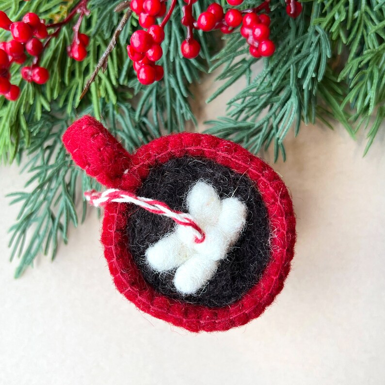 View of handmade felt hot chocolate Christmas ornament from above.