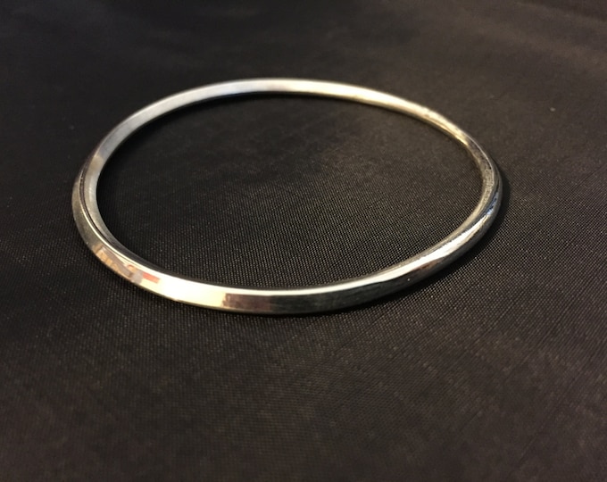 Hand forged sterling silver bangle square to round