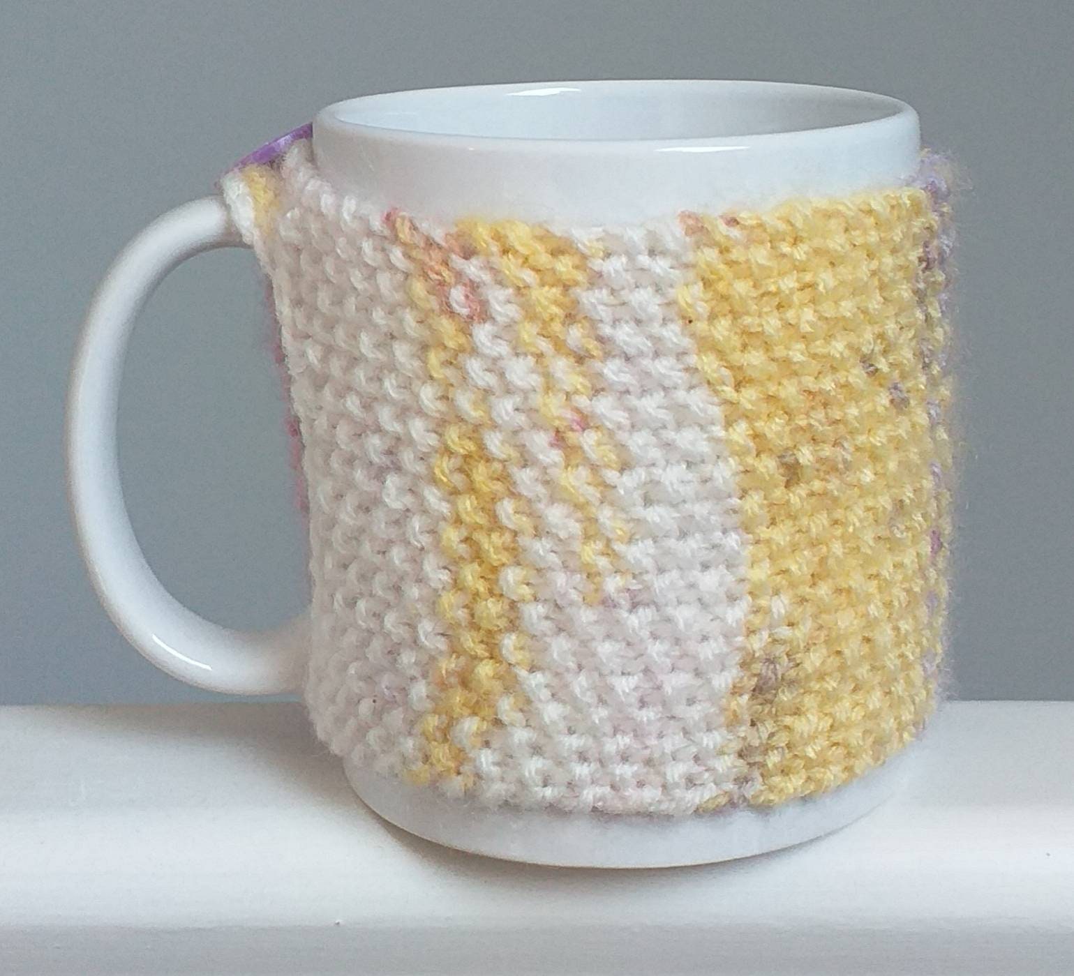 Mug hug hand knitted in random coloured wool. | Etsy