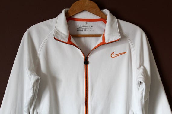 white and orange nike windbreaker