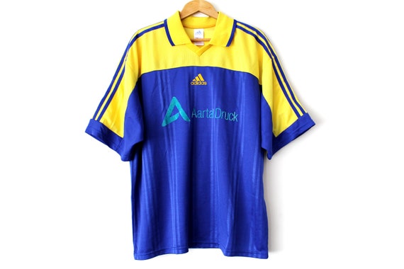 blue and yellow soccer jersey