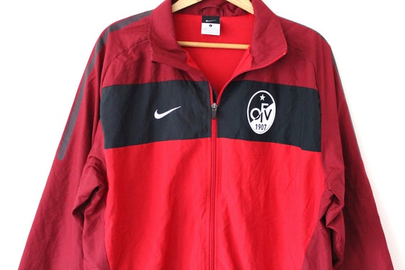 red zip up nike jacket