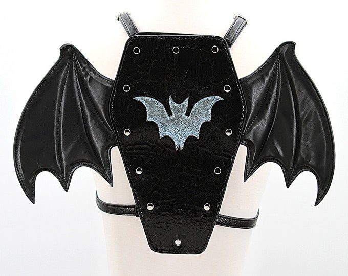 Featured listing image: Bat Winged Coffin Backpack Shoulder Crossbody Bag In Vinyl | Cute Dark Gothic