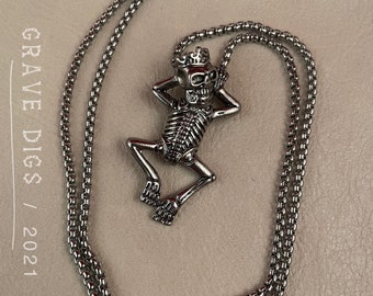 Chillin Skele King Pendant Necklace | Silver or Black Chain | Gothic Fashion Jewelry