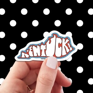 kentucky travel luggage sticker, hand display, polka dots pattern design background
