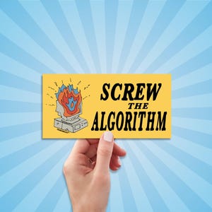 May include: A yellow rectangular sticker with the text "SCREW THE ALGORITHM" in black. The sticker features a cartoon image of a computer with a head and flames. The background is a blue radial pattern.