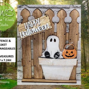 May include: Wooden Halloween-themed decoration featuring a fence, a ghost, and a jack-o'-lantern. The sign reads "Happy Halloween." The fence measures 5.5"W x 7.24H. The decoration is designed to be a tiny fence and basket interchangeable.