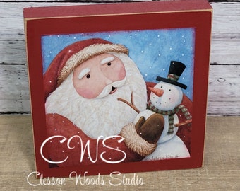 Santa Holding Snowman Square Wood Sign