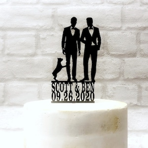 May include: Black silhouette cake topper featuring two grooms, a dog, and the text "SCOTT & BEN 09.26.2020".