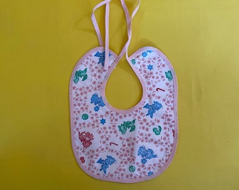 Babero vintage de los años 50: estampado de conejito kitsch rosa, sin usar