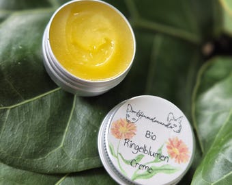 Crema de caléndula orgánica hecha a mano en una bonita lata, maravilloso cuidado natural de la piel, ungüento de caléndula, bálsamo labial, cosmética natural orgánica.