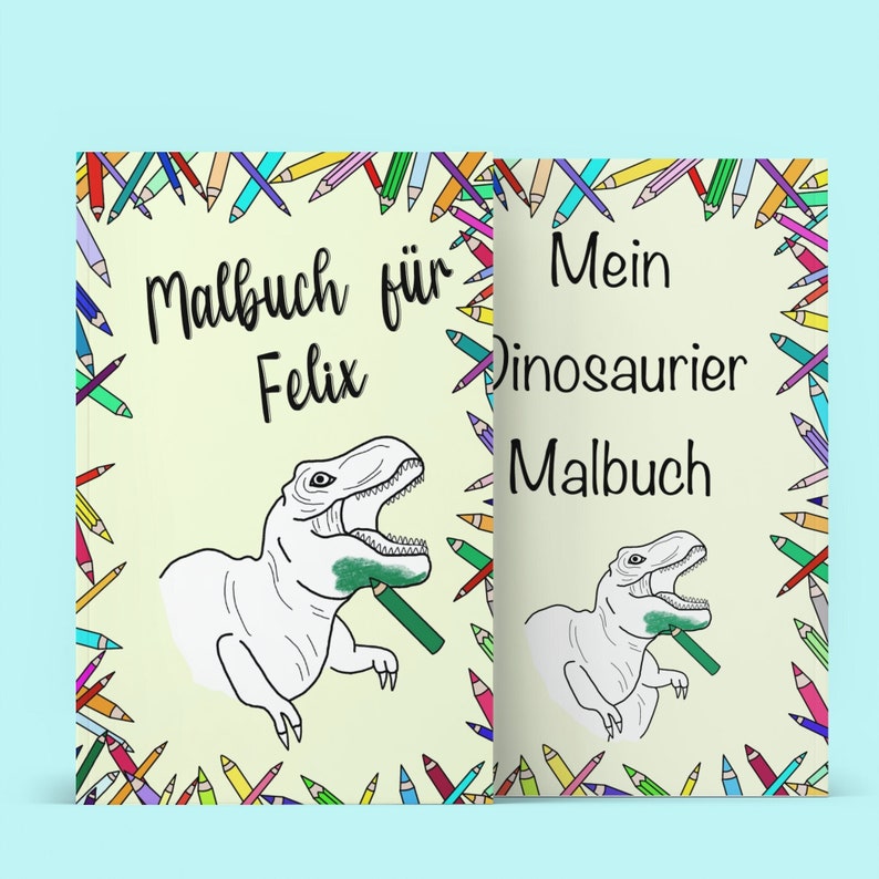 May include: A children's coloring book with a dinosaur illustration on the cover. The cover has the text "Malbuch f&uuml;r Felix" and "Mein Dinosaurier Malbuch". The book is surrounded by a border of colorful pencils.