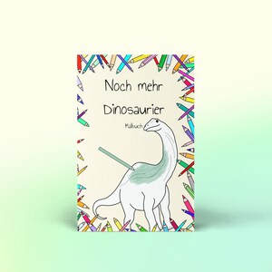 May include: A colouring book cover featuring a cartoon dinosaur and the text "Noch mehr Dinosaurier Malbuch". The cover is surrounded by colourful pencils.