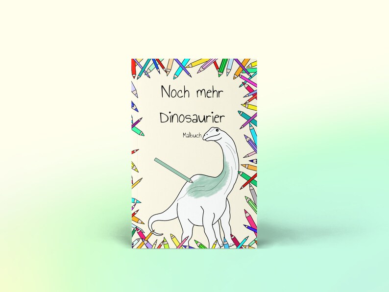 May include: A colouring book cover featuring a cartoon dinosaur and the text "Noch mehr Dinosaurier Malbuch". The cover is surrounded by colourful pencils.