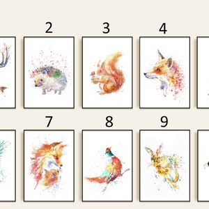 May include: A collection of ten watercolor animal art prints. Each print features a different animal, including a deer, hedgehog, squirrel, fox, raven, owl, pheasant, rabbit, and bee. The art style is colorful and abstract, with a white background.