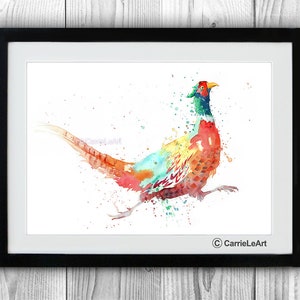 May include: A framed watercolor print of a pheasant in motion. The bird features vibrant colors including red, orange, yellow, green, and blue. The artwork is signed "CarrieLeArt" in the lower right corner.