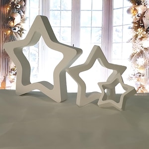 Raysin Stars | Christmas Advent | simple white winter decoration | gift | decoration set | cast ceramic | silhouette | Scandi | Christmas decoration