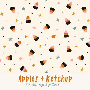 Op de afbeelding: Een naadloos herhalend patroon met snoepmaïs, sterren en stippen op een crèmekleurige achtergrond. De snoepmaïs is zwart, oranje en roze. De sterren zijn goud, roze en teal. De tekst "Apples + Ketchup" staat onderaan.
