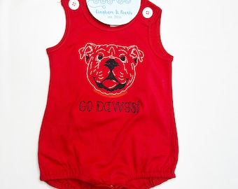 May include: Red sleeveless baby onesie with an embroidered bulldog face and the text "GO DAWGS!"