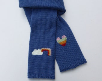 Rainbow knitted blue scarf, handmade in blue merino wool, a colourful scarf with a cloud and rainbow heart, with matching gloves available