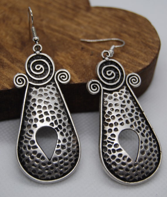 Statement piece hotsell earrings