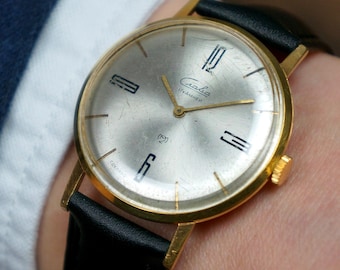 Vintage Slava Mechanical Watch: USSR Collectible Wristwatch