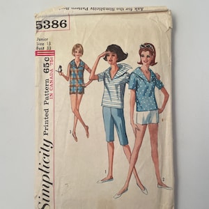 May include: Vintage Simplicity sewing pattern packet, featuring illustrations of three women in different outfits. The packet is labeled "5386" and includes text indicating size and price. The design includes a plaid top and shorts, a striped top and capri pants, and a polka dot top and shorts.