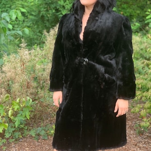 Vintage zwart getrimde bontjas jas vrouwen groot met satijnen voering