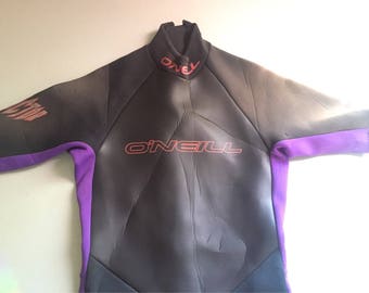 Retro 1990 Vintage O'neill Reactor púrpura y negro shorty wety wetsuit mujer medio hecho en los EE.UU.