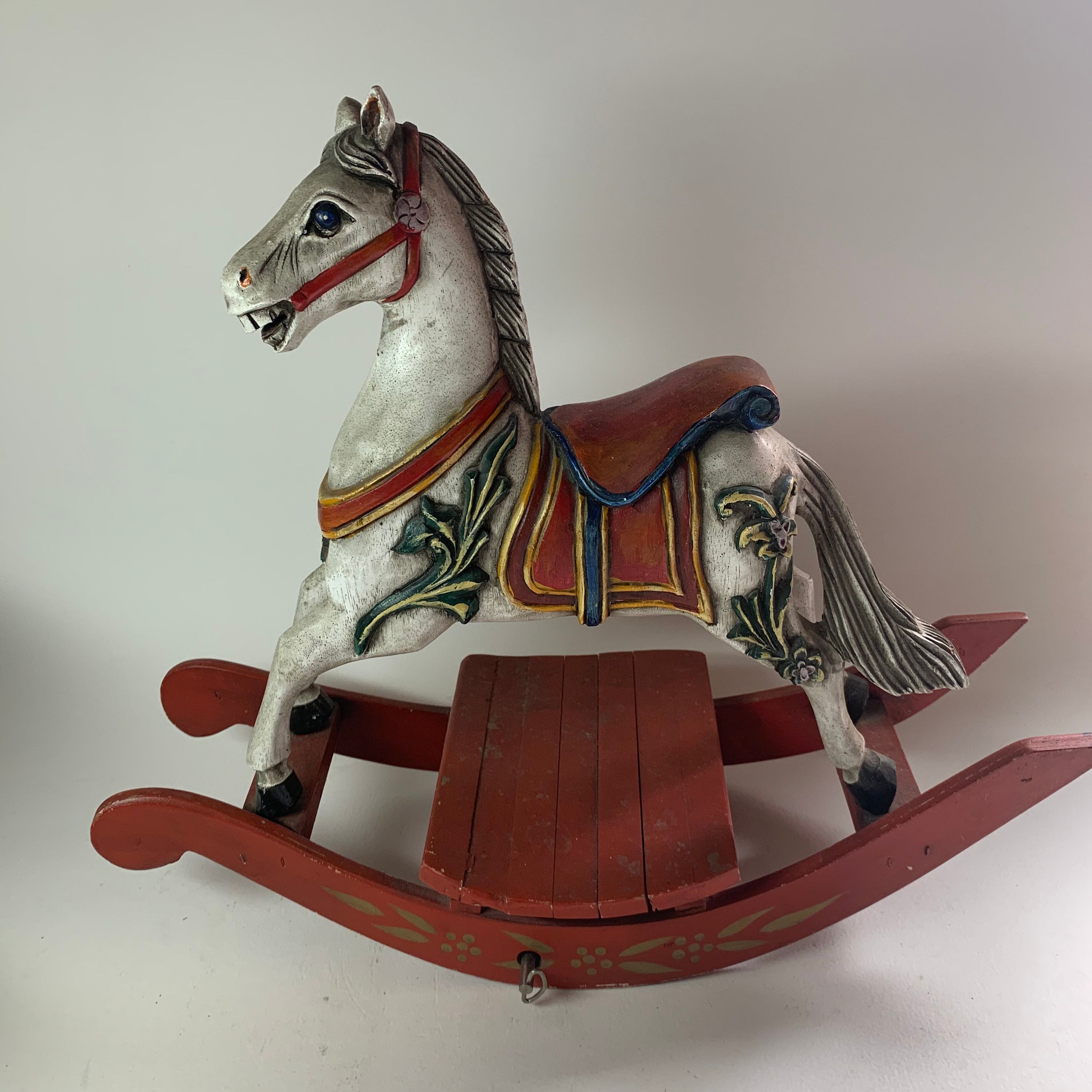 what does a rocking horse symbolize