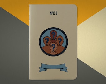 May include: A beige notebook with the title "NPC's" printed in black. The cover features a blue circle with four brown silhouettes of people with question marks over their heads.