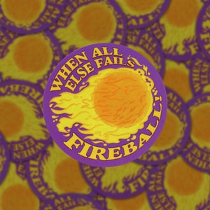 A round sticker with an illustration of a fireball on a purple background. Above the illustration are the words "When All Else Fails" and underneath is the word "Fire".