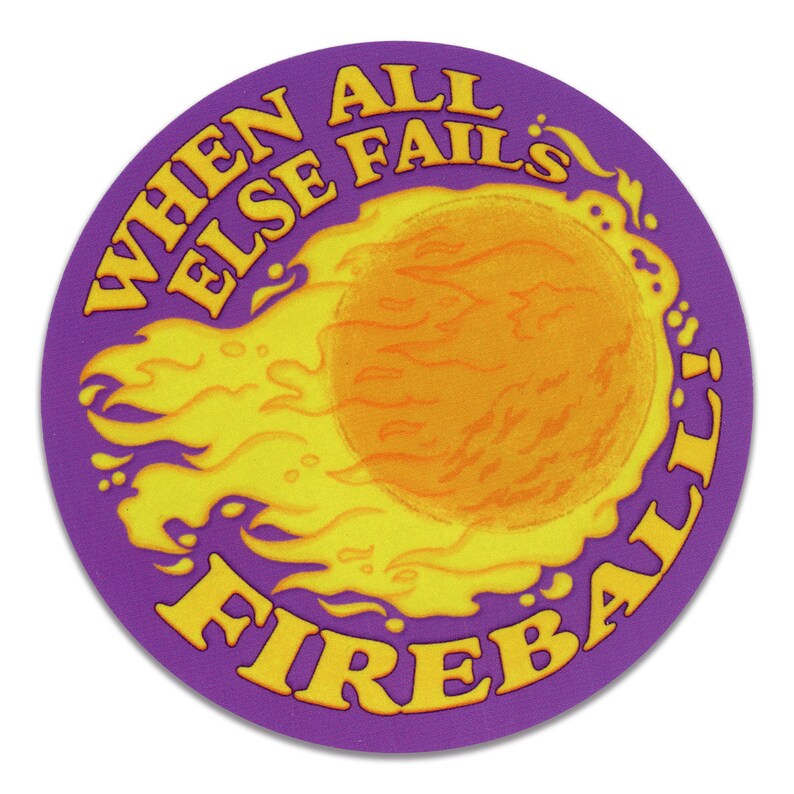 A round sticker with an illustration of a fireball on a purple background. Above the illustration are the words "When All Else Fails" and underneath is the word "Fire".