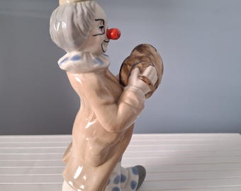 Palhaço com três caras - tocando pratos - porcelana