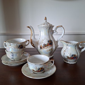 Teapot - creamer - cups and saucers set