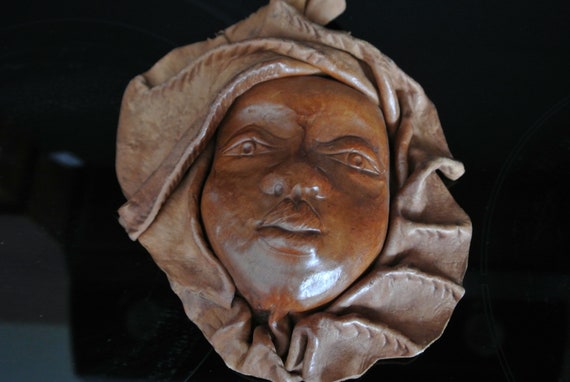 Statue masque visage femme