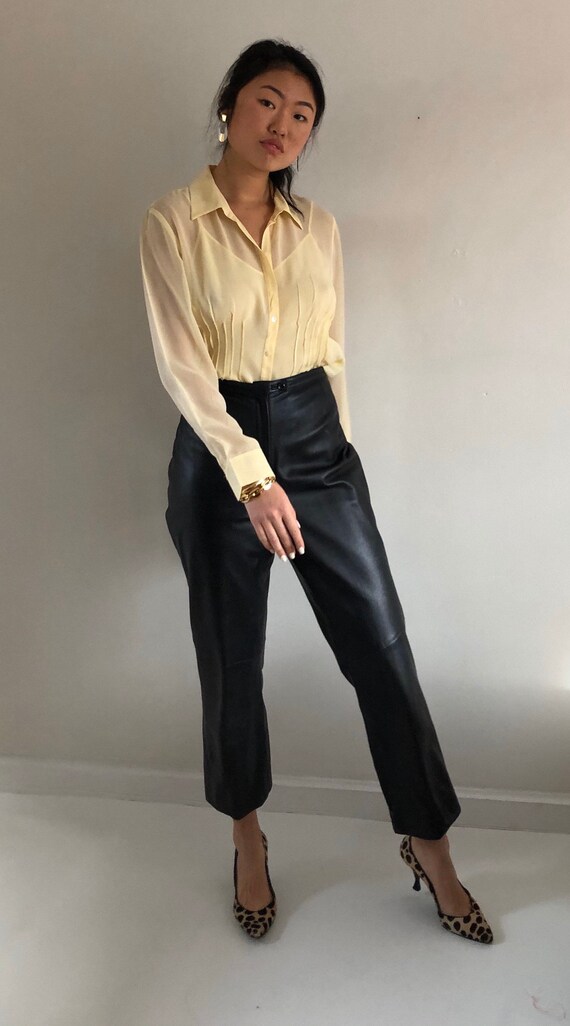 90s leather pants / vintage high waisted chocolate