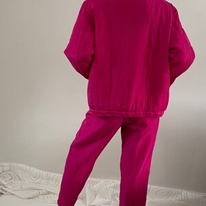 pink silk tracksuit