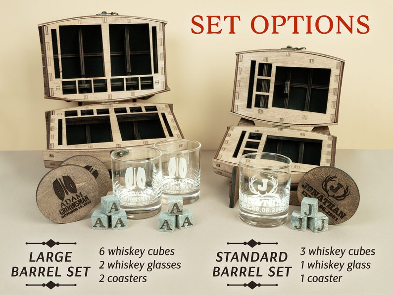 May include: Two wooden barrel sets in different sizes, one labelled "Large Barrel Set" and the other "Standard Barrel Set". The sets include whiskey glasses, coasters, and whiskey cubes. The larger set includes 6 whiskey cubes, 2 whiskey glasses, and 2 coasters. The smaller set includes 3 whiskey cubes, 1 whiskey glass, and 1 coaster.
