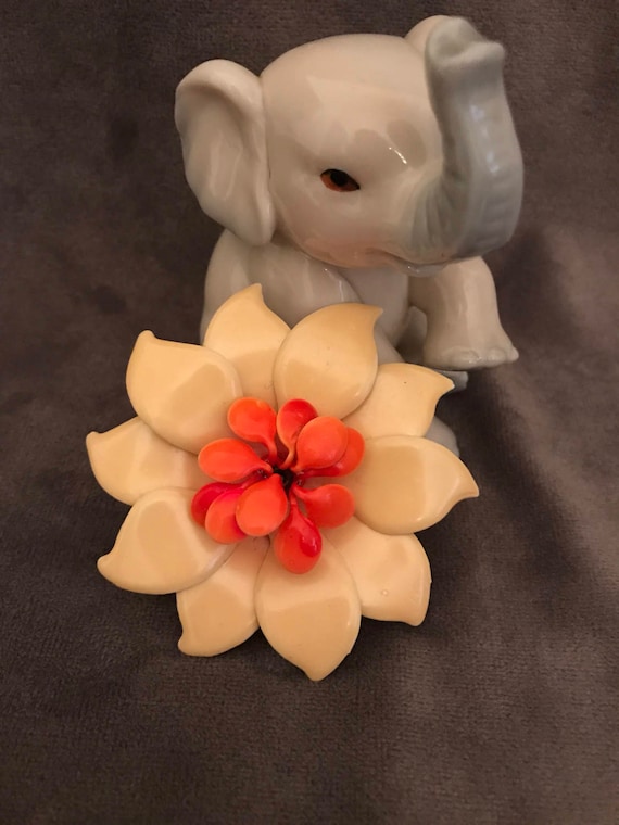 Vintage lucite yellow and coral colored flower