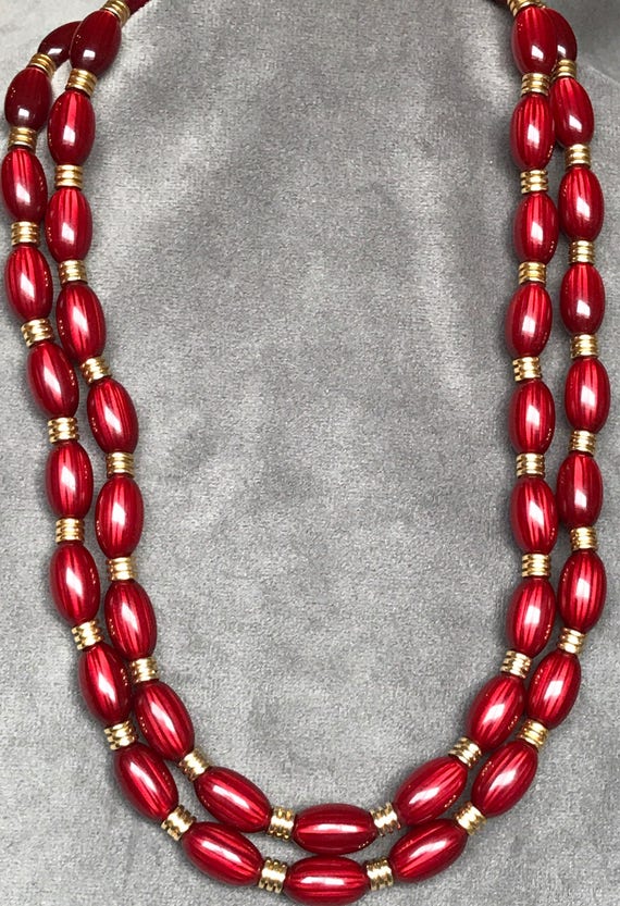 Double strand beaded cranberry and gold necklace