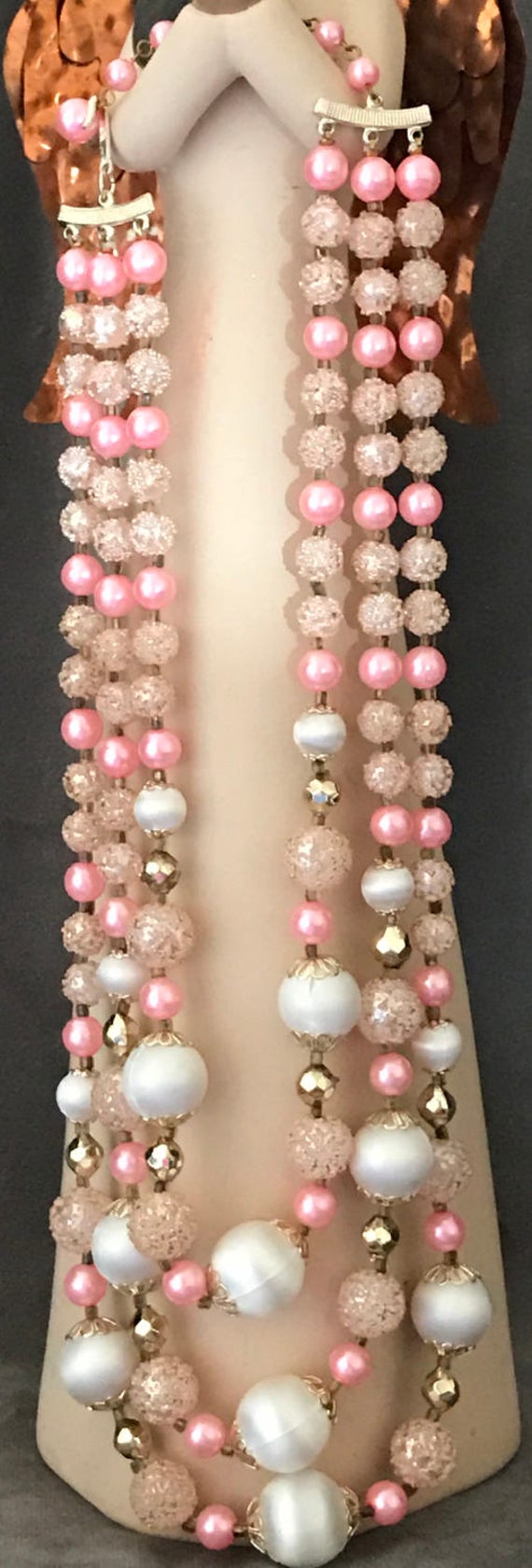 Multi strand beaded pink and white necklace, marke