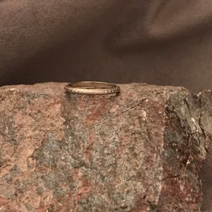 Stackable ring marked 18K