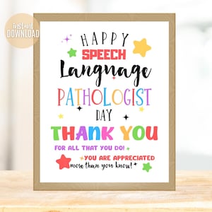 May include: A framed print with the words "HAPPY SPEECH LANGUAGE PATHOLOGIST DAY THANK YOU" in colorful text. The print includes decorative stars and the phrase "YOU ARE APPRECIATED more than you know!"