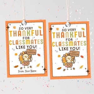 May include: Two Thanksgiving-themed gift tags with orange borders and white string. Each tag features the text "SO VERY THANKFUL FOR CLASSMATES LIKE YOU!" and a cartoon turkey holding a sign that says "HAPPY THANKSGIVING."