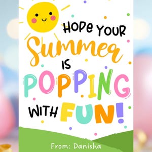 May include: A white card with a cartoon sun and the text "HOPE YOUR Summer IS POPPING WITH FUN!" in colorful letters. The card has a green border at the bottom and the name "Danisha" is written below the text.