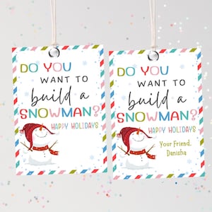 May include: Two holiday gift tags with the text "Do you want to build a snowman? Happy Holidays." Each tag features a snowman graphic wearing a red hat and scarf. One tag includes the text "Your Friend, Danisha."