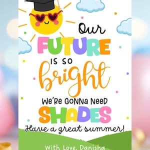 May include: A colorful graduation-themed card with the text "Our Future is So Bright, We're Gonna Need Shades." The card features a cartoon sun wearing a graduation cap and heart-shaped sunglasses, with the words "Have a great summer!" and "With Love, Danisha."