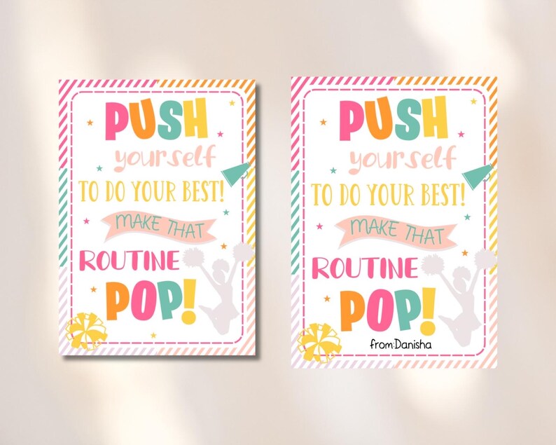 May include: Two motivational posters with a pink, yellow, and green striped background. The posters feature a white silhouette of a cheerleader with pom-poms and the text "PUSH yourself TO DO YOUR BEST! MAKE THAT ROUTINE POP!" The bottom poster also includes the text "from Danisha".
